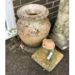 A terracotta garden urn, base detached, height 56cm