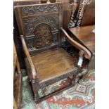 A 17th century style oak wainscot chair, width 58cm, depth 52cm, height 102cm
