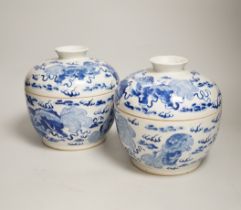 A pair of Chinese blue and white 'Buddhist lion' bowls and covers, chupu, probably made for the