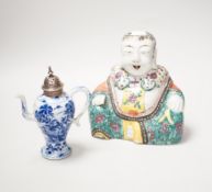 A 19th century Chinese famille enamelled porcelain figure of Budai, 17cm high and a Chinese Kangxi