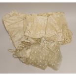 An Irish needle run 19th century lace veil, a machine lace ‘Blonde’ veil and two later cream silk