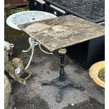 A Victorian style square marble topped cast iron garden table, width 69cm, height 73cm together with