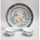 An 18th-century Chinese export famille rose twin pheasant dish and a pair of blue and white bowls,