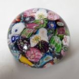 A Clichy scrambled cane paperweight, 5cm diameter