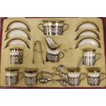 A cased George Jones Crescent China silver mounted coffee set, marks for Alexander Clark Co Ltd
