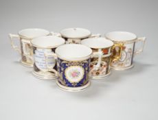 Six Royal Crown Derby Royal commemorative two handled cups