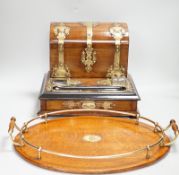 A Victorian walnut brass mounted dome topped stationery box and ink stand and an oval oak and a