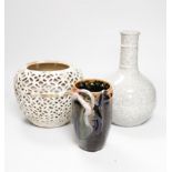 A Chinese crackle glaze bottle vase, a reticulated pottery vase and pottery vase, tallest 23cm high