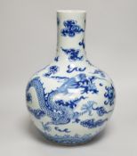 A Chinese blue and white ‘Dragon’ vase, tianqiuping, Qianlong mark but 19th century, 34cm Provenance