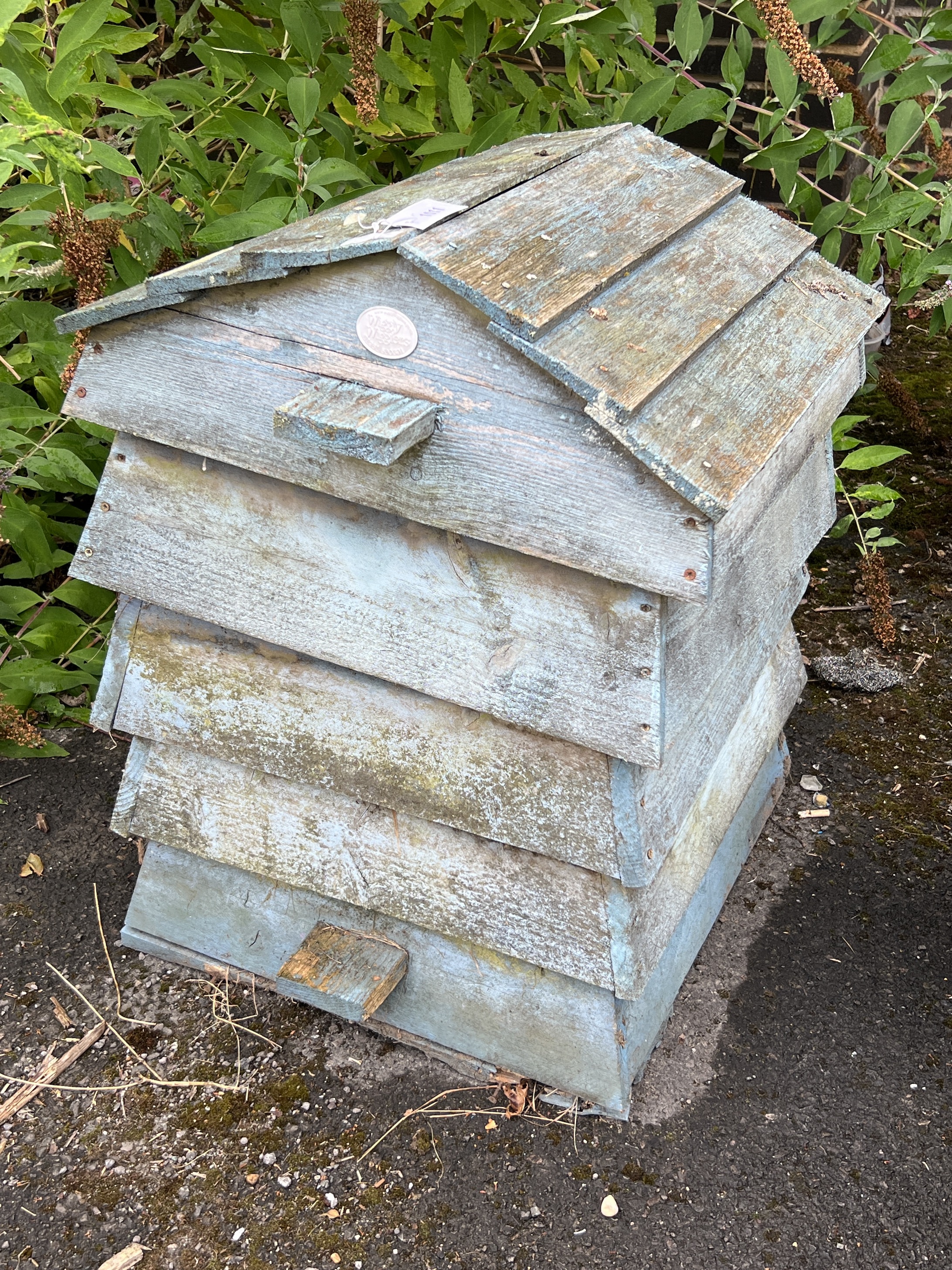 A painted wooden bee hive by Wiggly Wigglers, width 60cm, depth 55cm, height 78cm