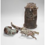 West African bronzes: Benin, a male and a female head, bangle anklet, a ceremonial pipe,