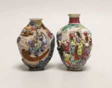 Two Chinese enamelled and moulded porcelain snuff bottles, Qianlong marks but mid 19th century, ‘