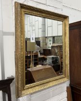 A rectangular giltwood and composition wall mirror, width 59cm, height 74cm together with an