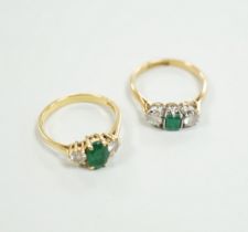 Two 18ct, single stone emerald and two stone diamond set rings, size M, gross weight, 5.5 grams.