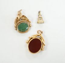 A Victorian 18ct gold and chalcedony set spinning fob, 30mm and two other fob seals including 9ct