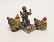 Two Austrian cold painted bronze chickens and a painted metal kneeling man, tallest 9cm