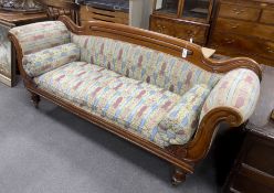 An early Victorian mahogany upholstered scroll arm settee, length 214cm, depth 62cm, height 90cm