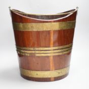 A late 18th century Dutch brass bound mahogany oyster bucket, 35cm tall