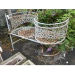 A painted metal garden 'love seat', length 110cm, width 48cm, height 82cm