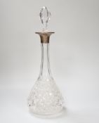 A George V silver collared cut glass decanter and stopper, London 1926, 37cm tall