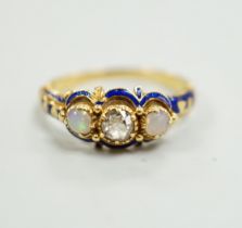 A late Victorian yellow metal, single stone diamond, two stone opal and enamelled dress ring, size