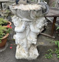 A large painted stone cherub and scallop shell garden fountain, height 93cm