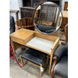 A G-Plan oak and teak dressing table, width 102cm, depth 42cm, height 136cm and an initialled