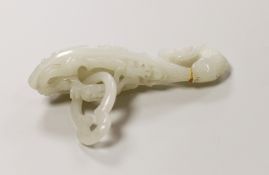 A Chinese white glass belt hook, apocryphal Qianlong marks (damaged)