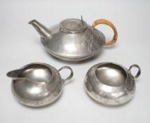 Art Nouveau Archibald Knox for Liberty, Tudric pewter three piece tea set, the teapot with woven