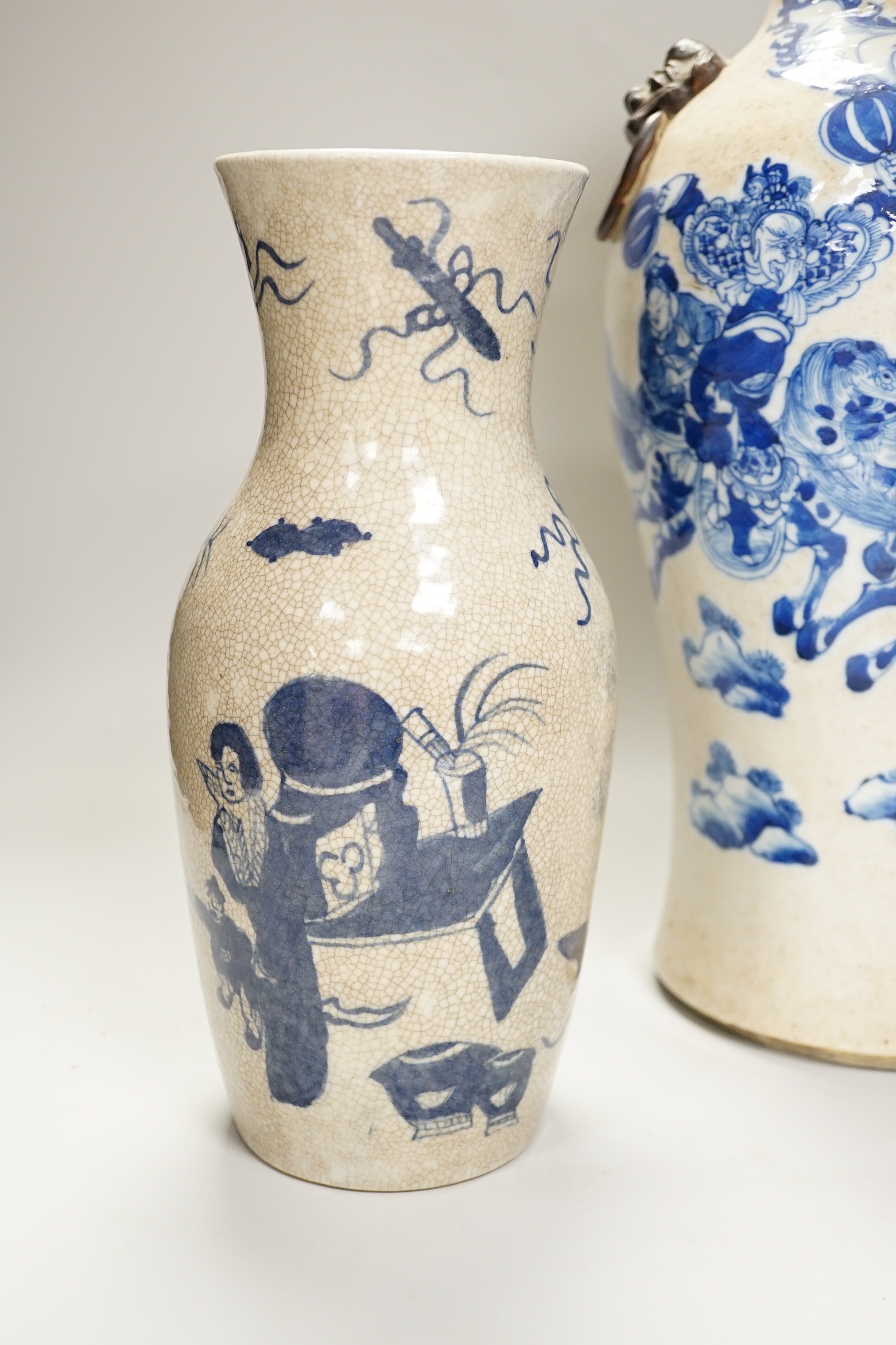 An early 20th century Chinese crackle glaze blue and white vase, 44cm and a later smaller vase - Image 2 of 8