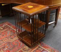 An Edwardian style satinwood inlaid mahogany revolving bookcase, width 48cm, height 77cm