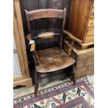 A Victorian elm and beech Windsor elbow chair, width 52cm, depth 40cm, height 87cm
