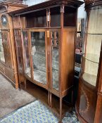 An Arts & Crafts marquetry inlaid mahogany bowfront display cabinet, width 157cm, depth 38cm, height