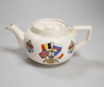 A WWI commemorative teapot with ‘For Right and Freedom’ motto and allied flags, 16cm wide