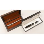 A cased Montblanc ball point pen and a Parker 105 pen