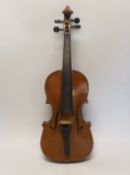 A three quarter size German violin, in case violin 56cm long