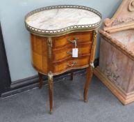 A Louis XVI style marble topped kidney shaped kingwood three drawer side table, width 52cm, depth