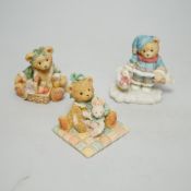 A collection of “Cherished Teddies” TM