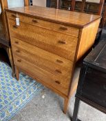Attributed to Alfred Cox for Heals. A mid century walnut five drawer chest, width 85cm, depth