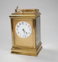 An hour repeating brass carriage clock with key, 16cm