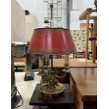 A gilt metal three branch table lamp with toleware shade, a mahogany pedestal and a wall bracket