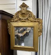 An 18th century style carved giltwood wall mirror, width 57cm, height 73cm