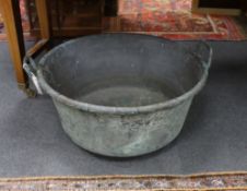 A Victorian two handled copper cauldron, diameter 65cm, height 35cm