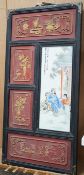A 20th century Chinese screen with an inset porcelain plaque