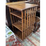 An early 20th century oak three tier revolving bookcase, width 51cm, depth 53cm, height 105cm