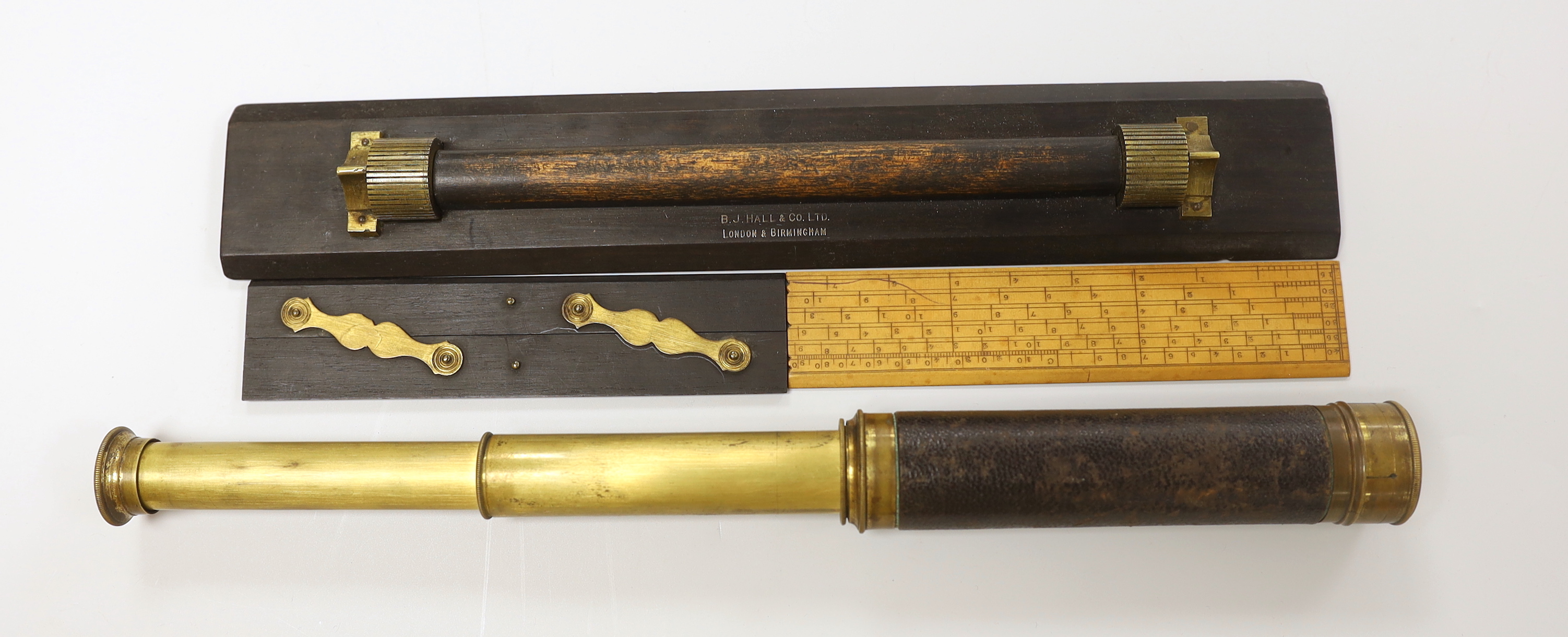A ruler by B.J. Hall, two others and a three draw telescope, telescope 42 cms fully drawn