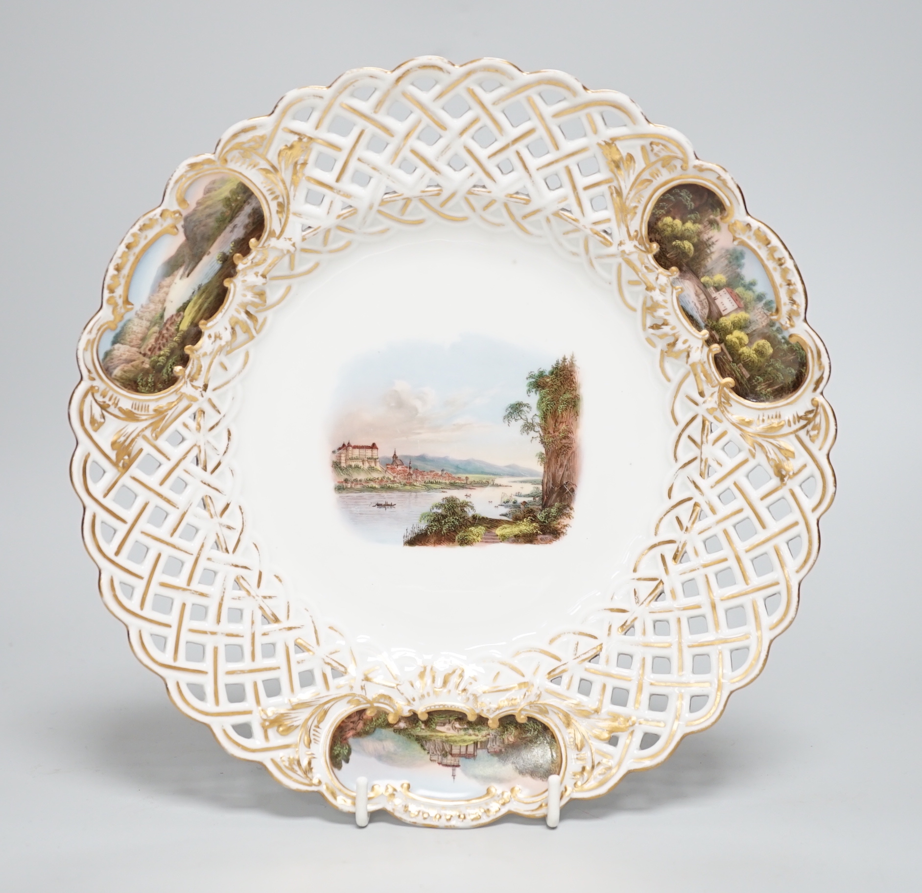 A Meissen topographical reticulated plate, 19th century, painted with named views; Pirna,