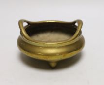 A Chinese bronze tripod censer, ding, Xuande mark but 19th century, 13cm wide