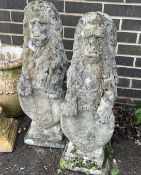 A pair of reconstituted stone heraldic lion garden ornaments, height 78cm