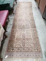 An ivory ground Afghan runner, 370 x 93cm